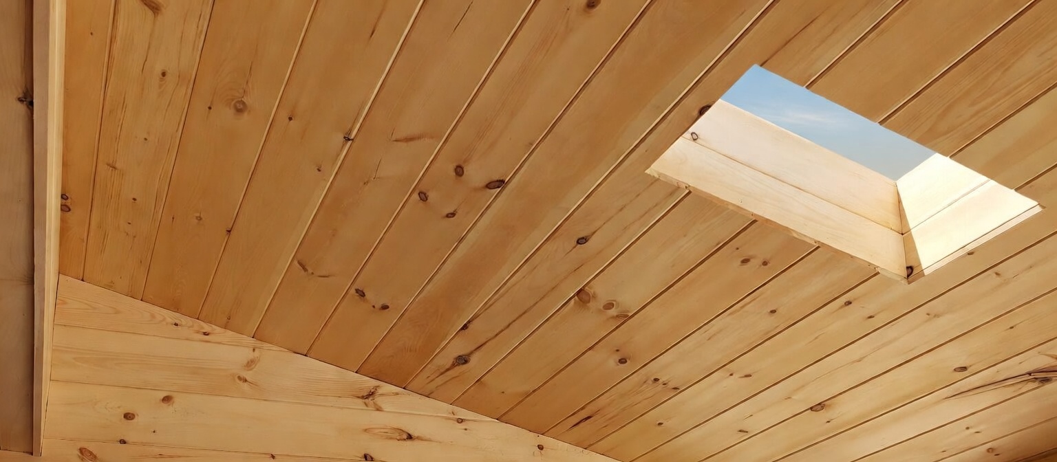 Tongue-and-groove pine ceiling with skylight